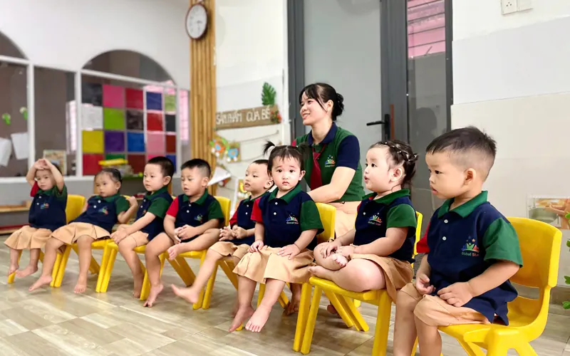 Children learning with their teacher in a Global Star School bilingual preschool classroom